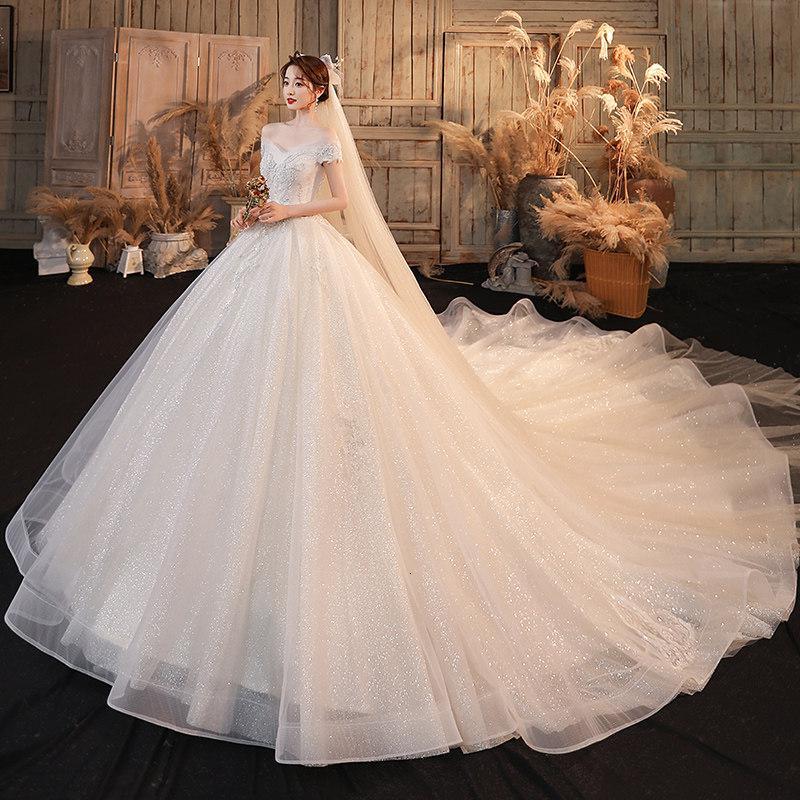 新款一字肩新娘主婚纱礼服2020新款气质拖尾森系超仙梦幻简约冬季视频