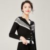 欧昵雪V领拼接睫毛蕾丝长袖针织衫女短款小外套