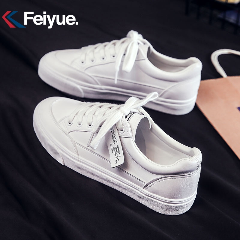 飞跃(FEIYUE)低帮简约百搭皮面小白鞋情侣款