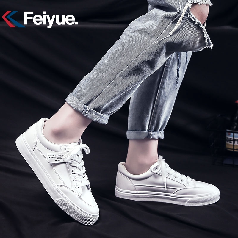 飞跃(FEIYUE)低帮简约百搭皮面小白鞋情侣款