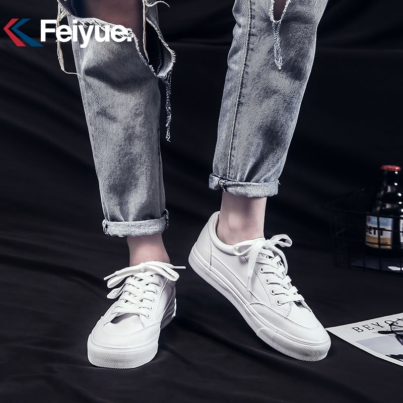 飞跃(FEIYUE)低帮简约百搭皮面小白鞋情侣款