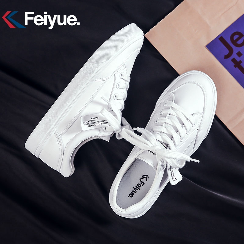飞跃(FEIYUE)低帮简约百搭皮面小白鞋情侣款