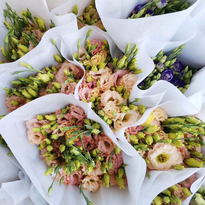 无纺布鲜花套袋,棉带,鲜花袋包装袋环保鲜花套袋梯形无纺布袋 上18下9