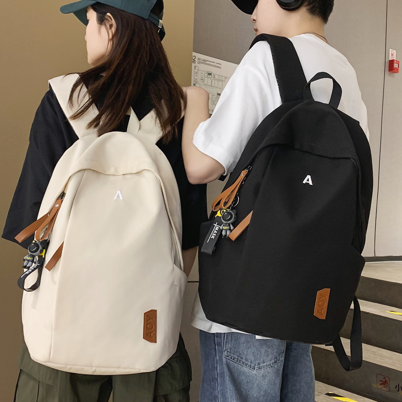 双肩包男士大容量初中高中大学生书包日系休闲百搭新款旅行背包女