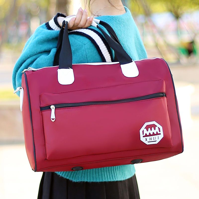 行李包女大容量手提拉杆包打工帆布包短途旅行出差航空旅行袋大号