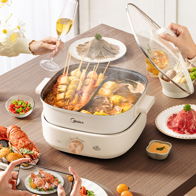 美的(Midea)电火锅6L鸳鸯火锅专用锅加深电煮锅速沸电锅一体多功能锅多用途火锅分体设计MC-HGS303002高清大图