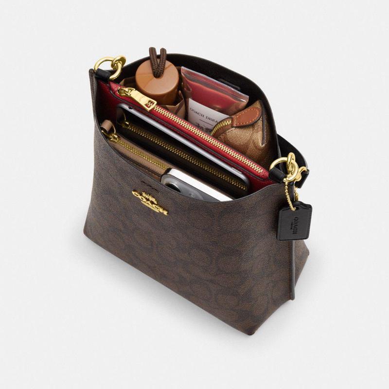 蔻驰coachmollie心形印花签名帆布时尚百搭简约休闲22英寸水桶包女士