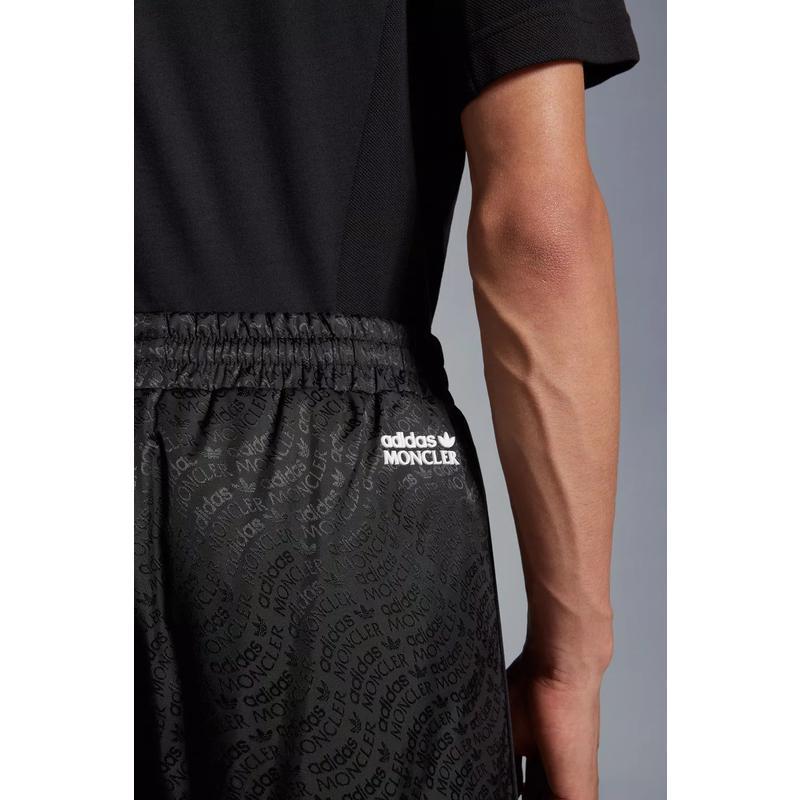 盟可睐(MONCLER)男款双面羽绒运动裤户外休闲裤黑色羽绒填充贴边