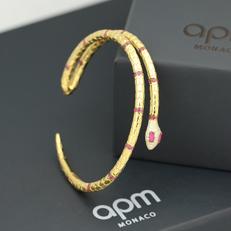 APM Monaco EGYPTIAN TRIBUTE系列金黄色女士925银蛇神银手镯配合成红晶钻 AB3506XKRY