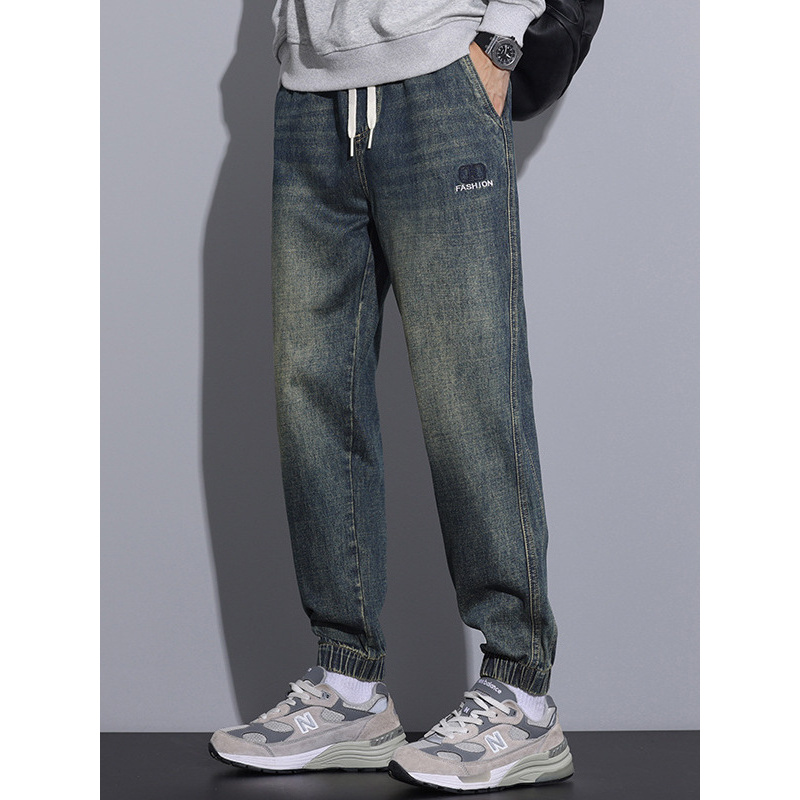 [上新]束脚牛仔裤男青年宽松潮牌时尚松紧腰哈伦裤复古做旧