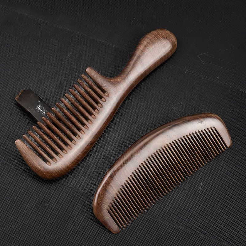 图书>期刊/杂志>男士>图书其它>虞美人金丝檀木梳木头梳子家用静电