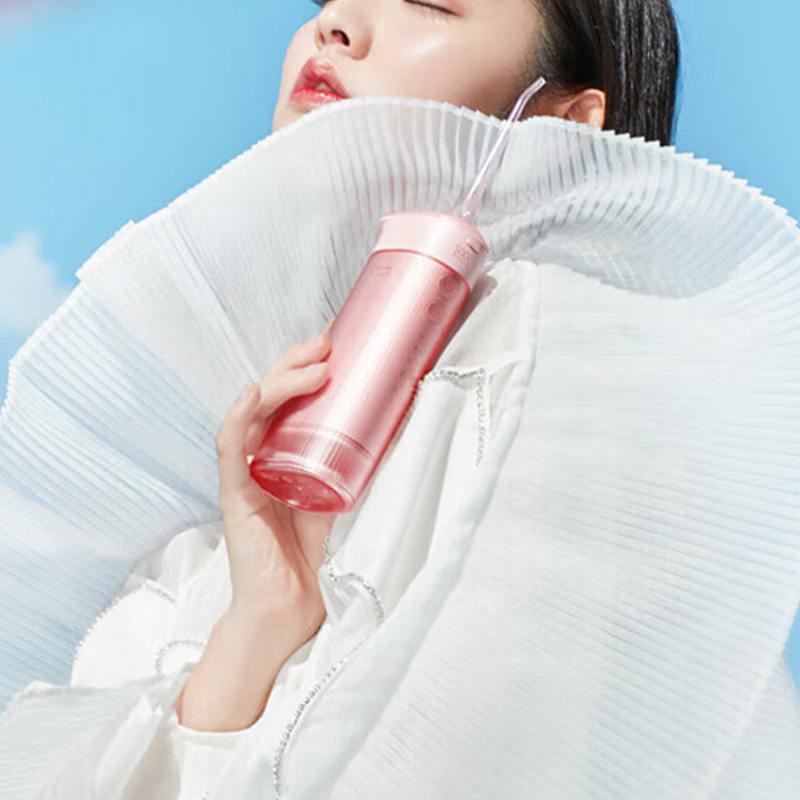 素士 W1 便携抽拉式冲牙器 150ml(个) 樱花粉高清大图