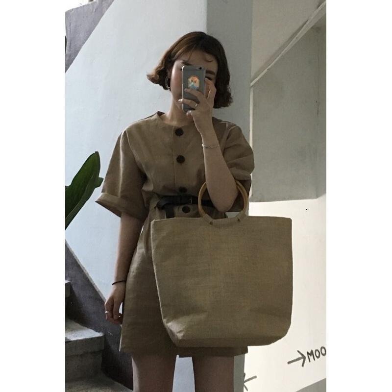韩国鬼马系少女春夏敲显腿长单排扣连衣裙配腰带 咖色 均码