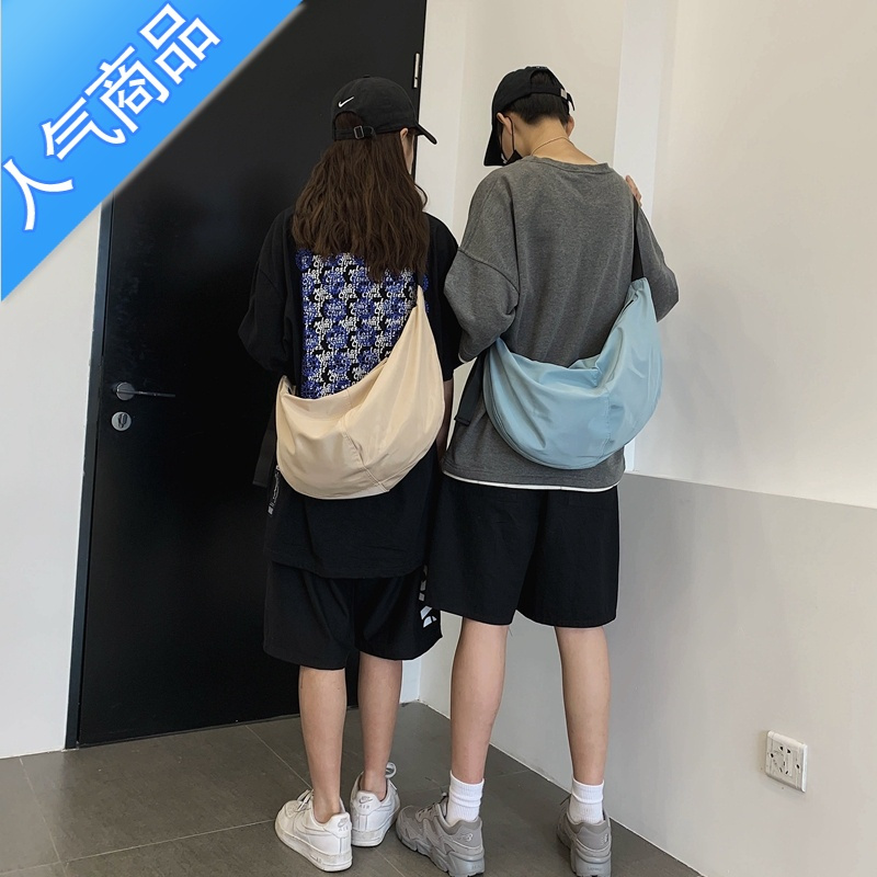 封后日系工装斜挎包男士潮牌简约百搭单肩包女ins超火休闲机能饺子包单肩包男