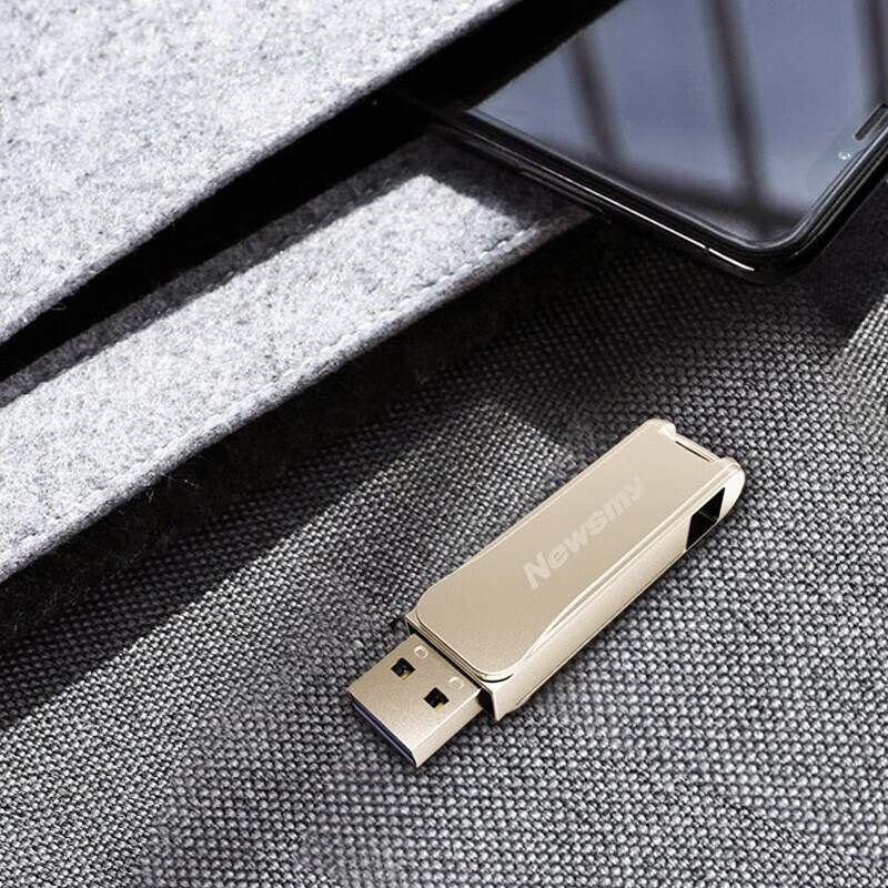 纽曼 USB3.0 U盘 V33金属旋转款 快速平稳传输 安心出众读写 音源发烧级车载U盘 尊贵金 64GB高清大图