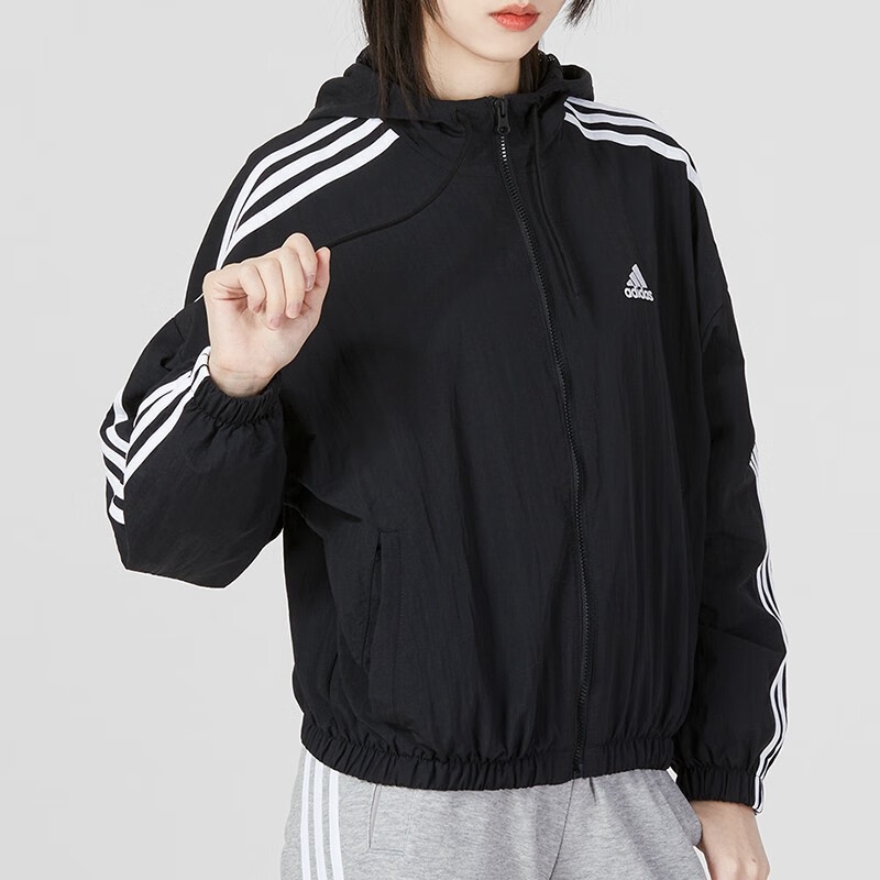 Adidas阿迪达斯外套女子新款运动服梭织防风休闲防风连帽夹克HT3399 ZP高清大图