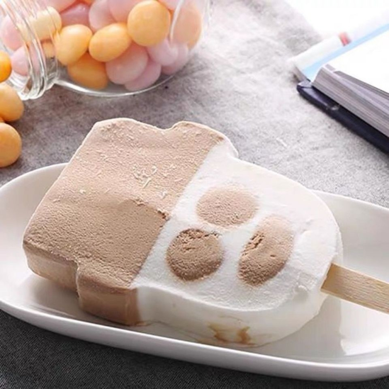 生鲜>速食饮品>冰激凌/冰棍>田牧>田牧花脸牛奶巧克力口味雪糕70g>