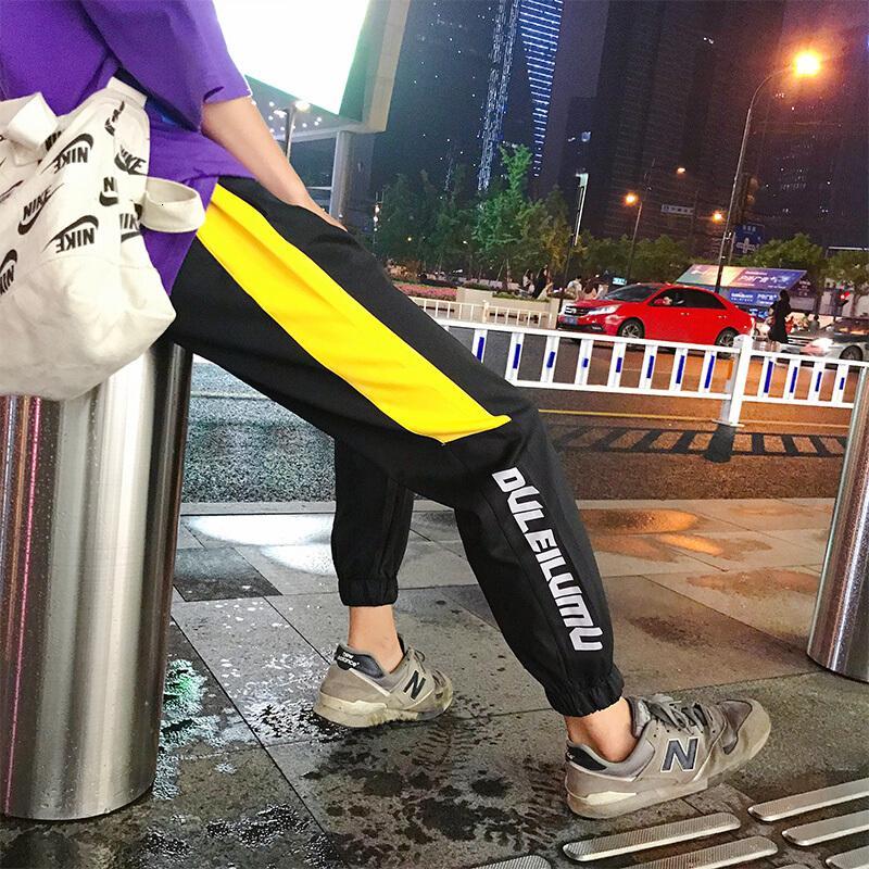 韩版潮流哈伦裤男生百搭修身脚九分休闲裤紫裤