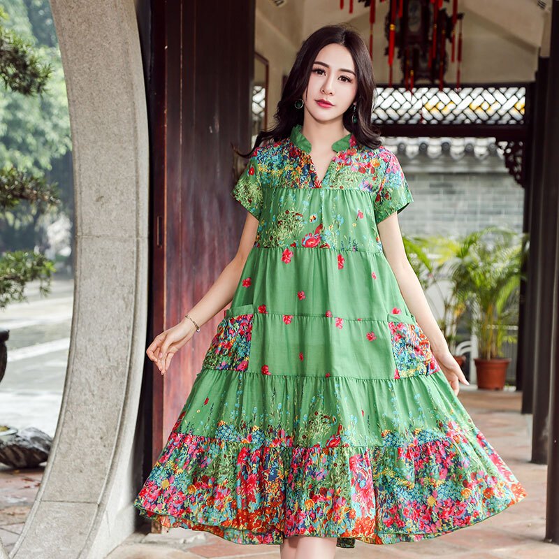 2018夏季民族风女装中长款短袖连衣裙气质印花宽松裙子桔红色均码