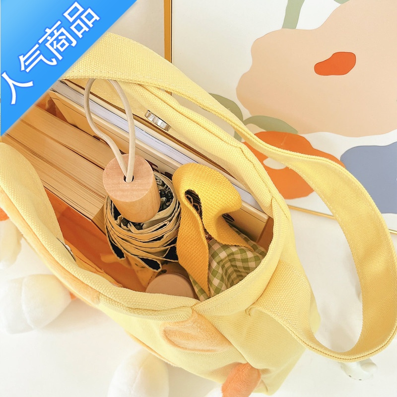 封后可爱斜跨单肩包2022新款芝士奶酪帆布包学生女网红百搭卡通上课包