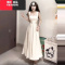 YIBUSHENG白色吊带挂脖连衣裙子女2024年新款季收腰长裙高级感高腰大摆裙