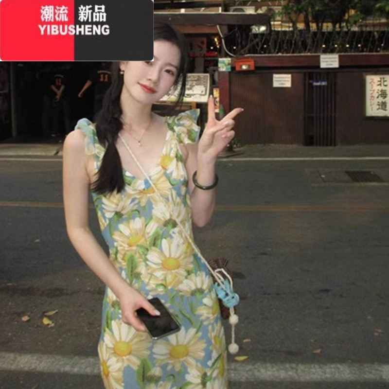 YIBUSHENG茶歇法式油画碎花吊带连衣裙子女装季2024新款海边度假沙滩长裙