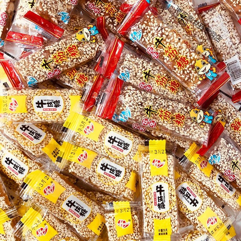 老式花生牛皮糖牛筋糖特产手工芝麻牛皮糖正宗芝麻软糖果零食图片