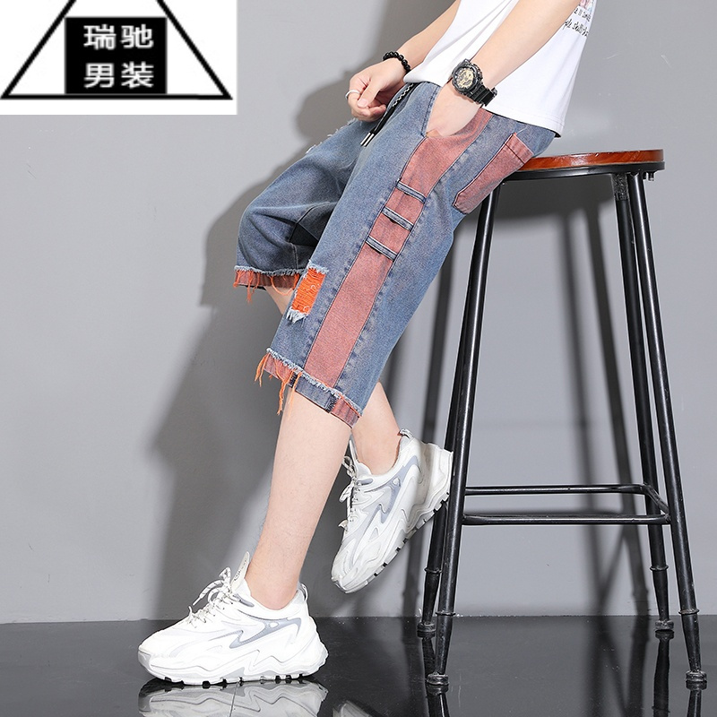 希杰狮王男士牛仔裤