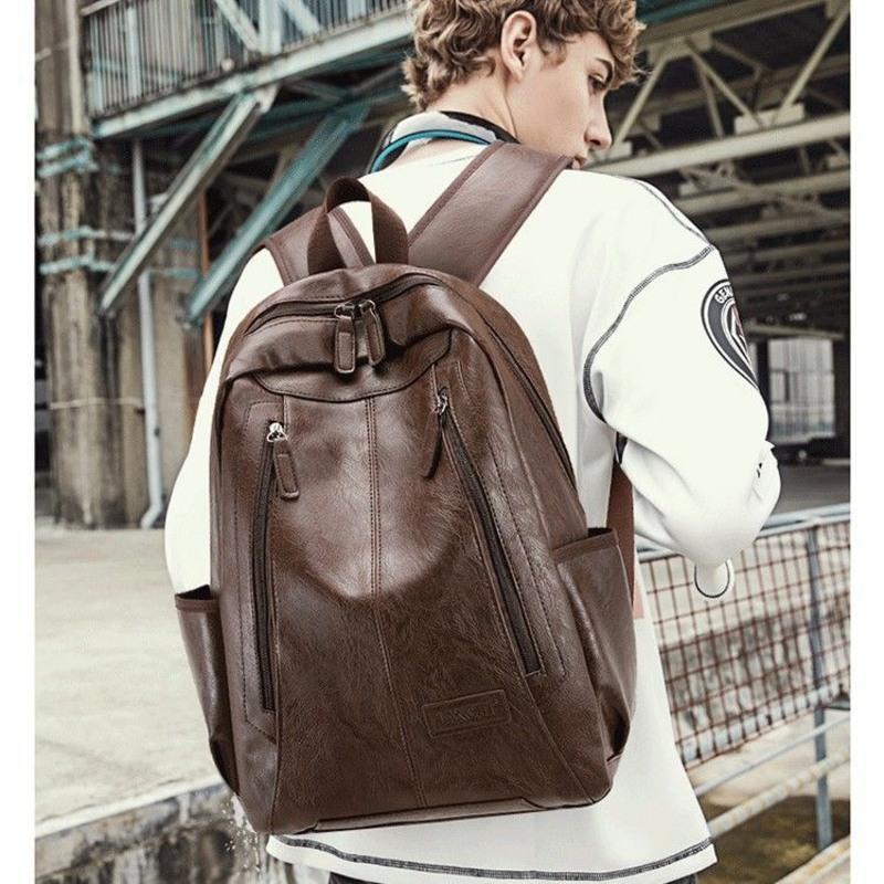 真皮质感双肩包男士潮流背包男韩版复古旅行包休闲学生书包电脑包黑色