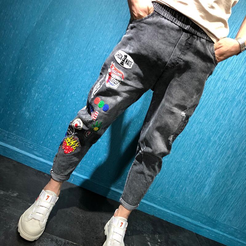 社会神伙仔裤红印花九分裤男修身脚裤力哈伦裤潮