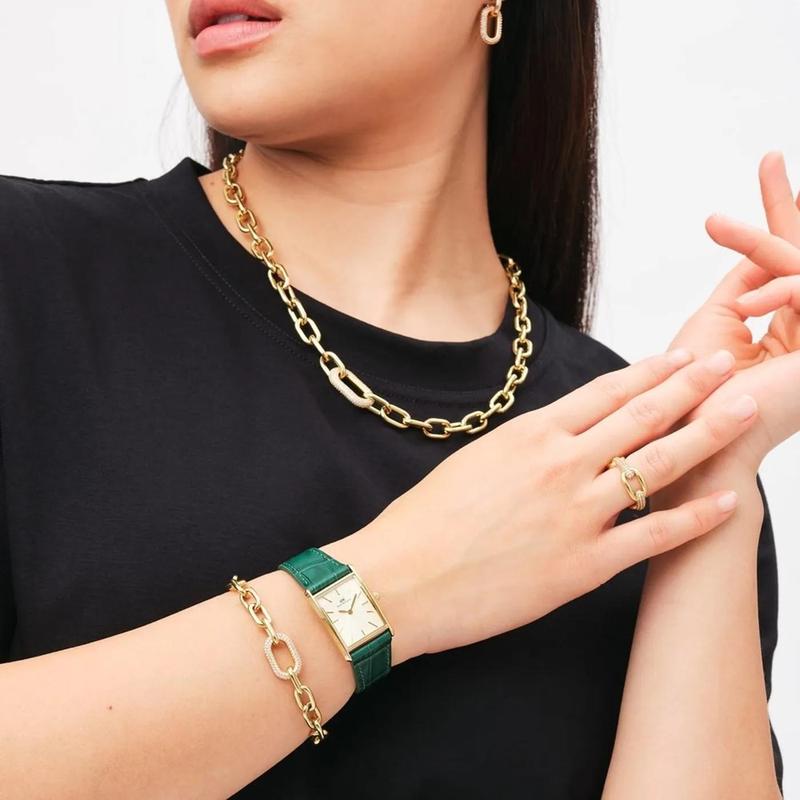 丹尼尔惠灵顿(Daniel Wellington)女士机械表黄金色镀层大气母贝表盘优雅时尚手表高清大图