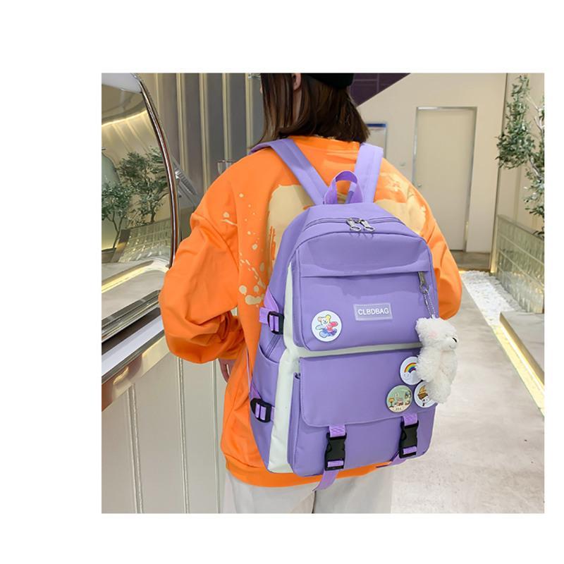 书包女初中生轻便小学生女孩三到六五年级大容量双肩包2021年新款 紫色单包+送4个徽章