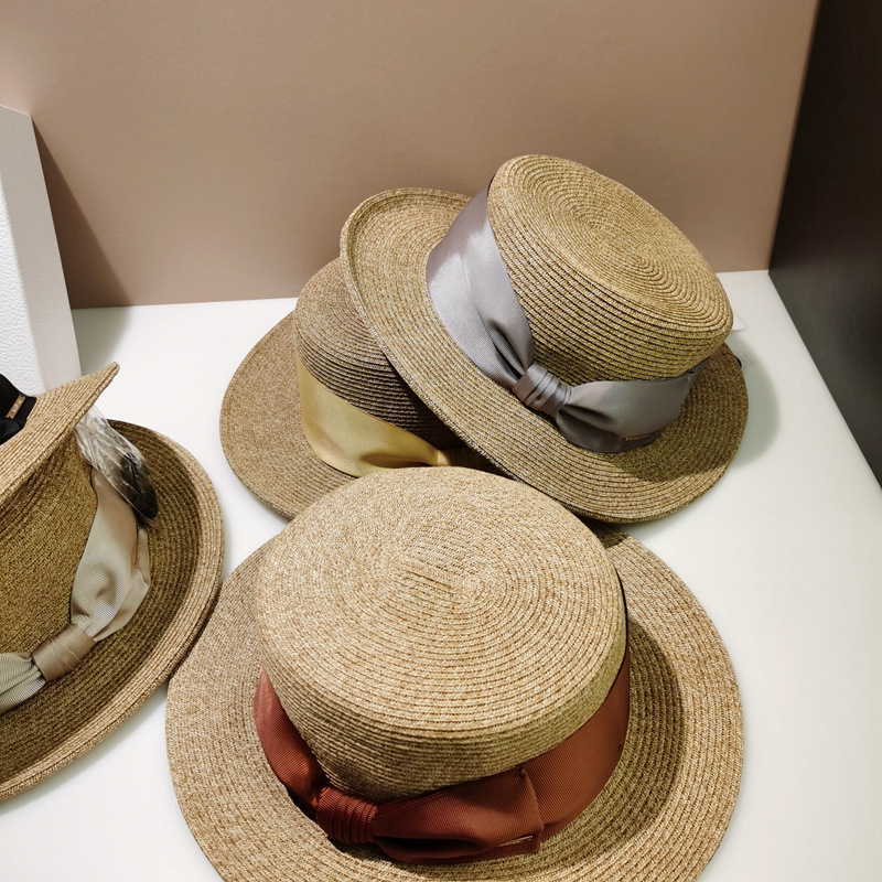 日本款休闲日搭混色草编蝴蝶结装饰女平顶平沿防晒沙滩草帽子视频