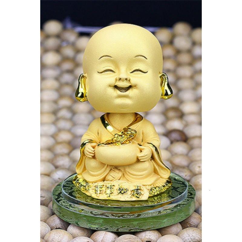 适用于可爱汽车摆件圣诞节绒沙金摇头汽车香水座汽车内饰创意摆件