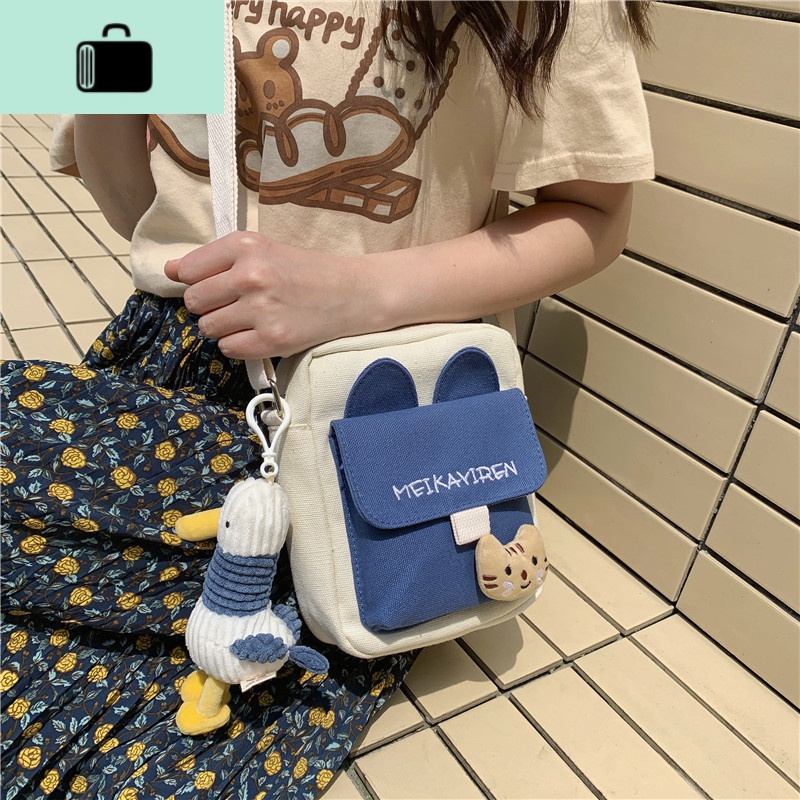 帆布小包包女2020新款ins日系斜挎包可爱百搭学生文艺单肩手机包NEWLAKE高清大图