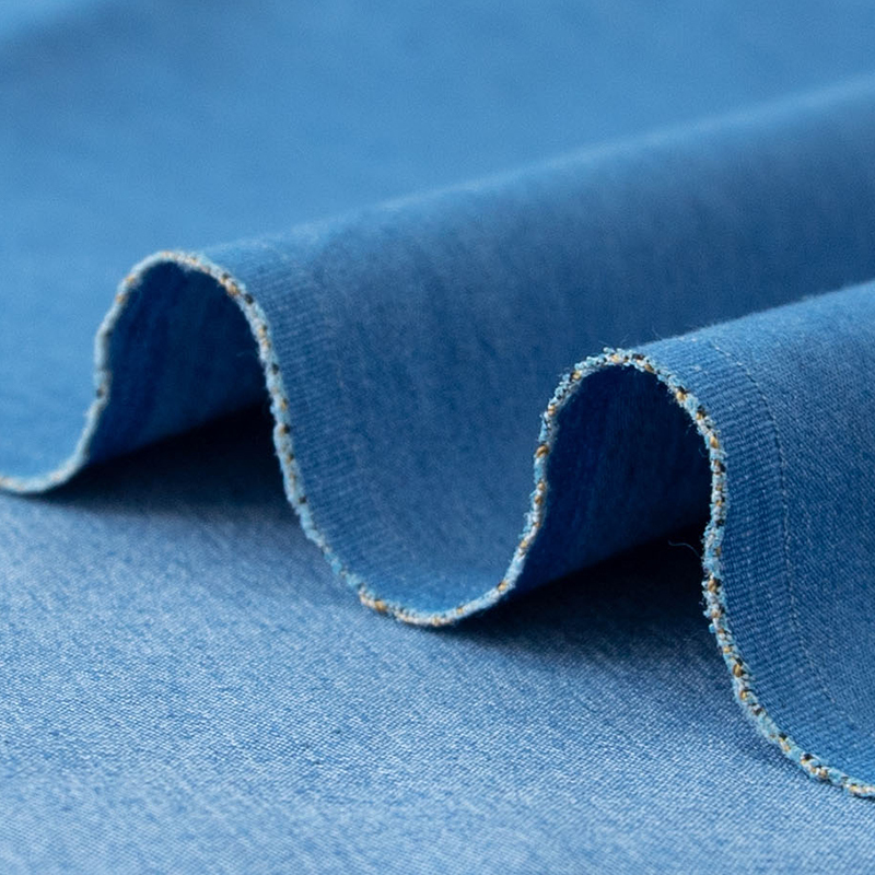弹力纯棉水洗牛仔布料箱包衣服裤子衬衫diy服装夏季薄款蓝色面料乳