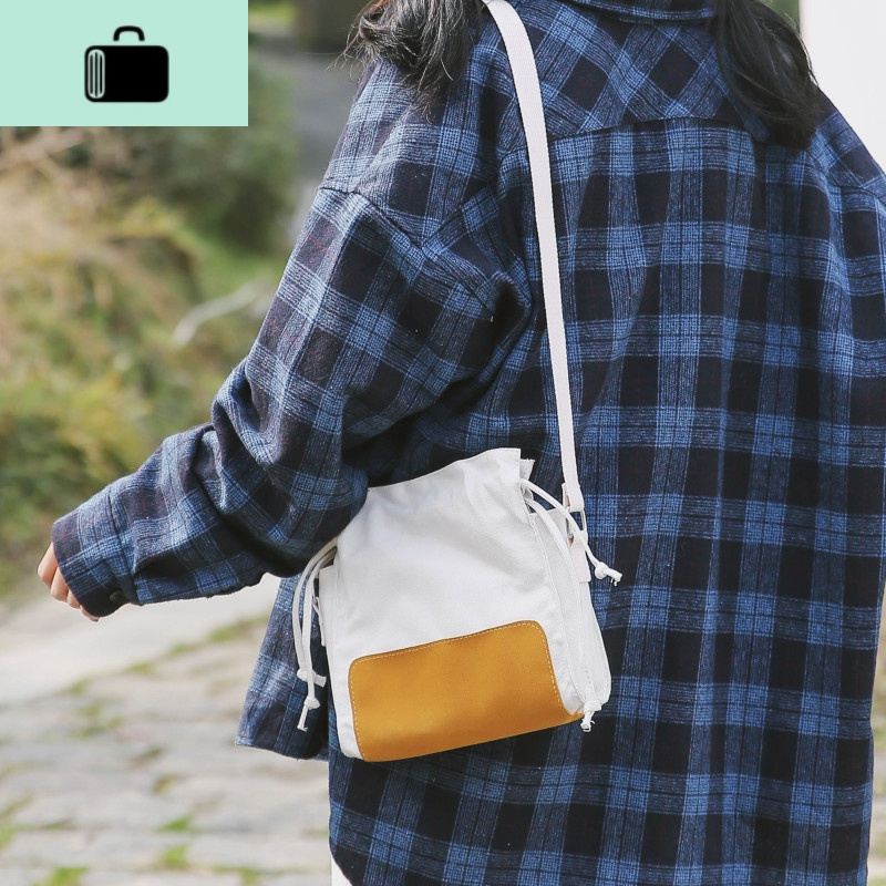 小包包文艺简约帆布单肩包斜挎包森系撞色水桶包女new lake女士单肩包