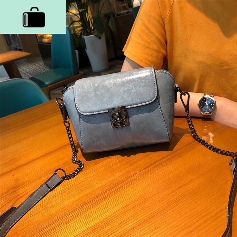 真皮斜挎小包女新款时尚油蜡皮牛皮单肩包迷你手机包链条饺子包潮NEWLAKE 浅蓝色