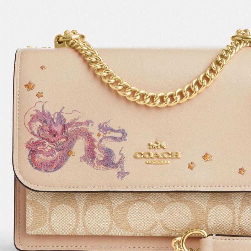 蔻驰coachnewyearklare标志性帆布和龙经典时尚商务休闲斜挎包单肩包