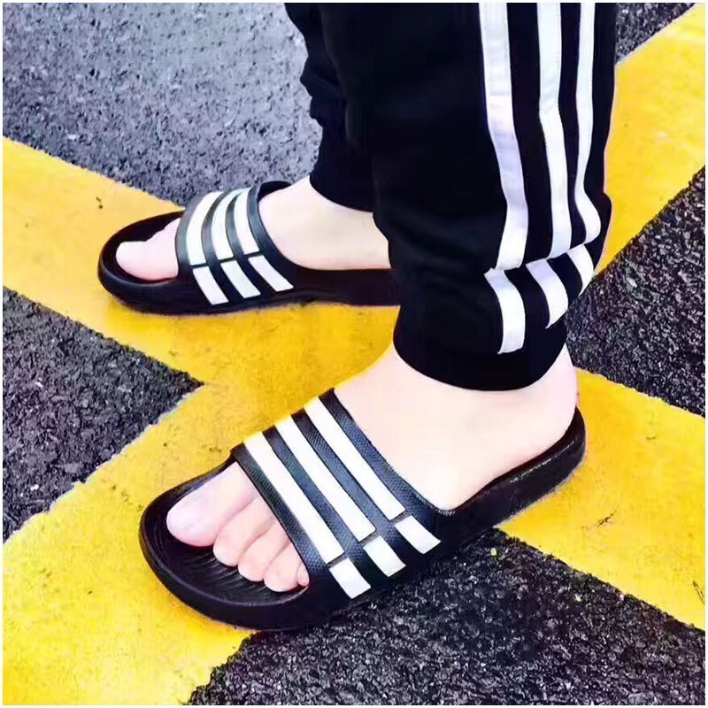 阿迪达斯男鞋女鞋18年夏季新款情侣运动拖鞋奥利奥三条纹游泳沙滩凉鞋G15890