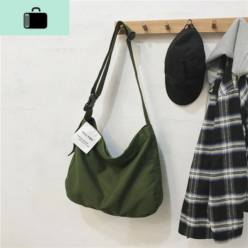 潮牌大容量慵懒风帆布包休闲斜挎包男女学生书包文艺布袋包单肩包new