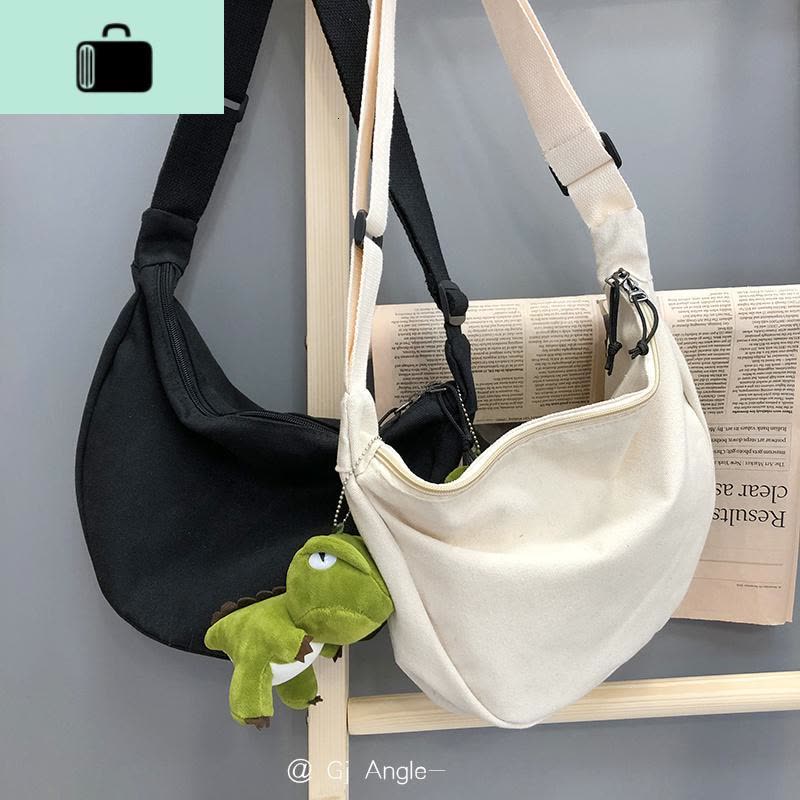 可爱日系复古文艺帆布斜挎女大容量单肩休闲百搭时尚街拍饺子包女NEW LAKE女斜挎包图片