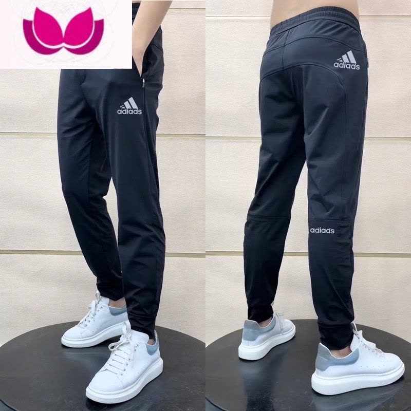 七斓夏季牛奶冰丝休闲裤男弹力透气九分速干裤新款潮牌印花小脚运动裤图片