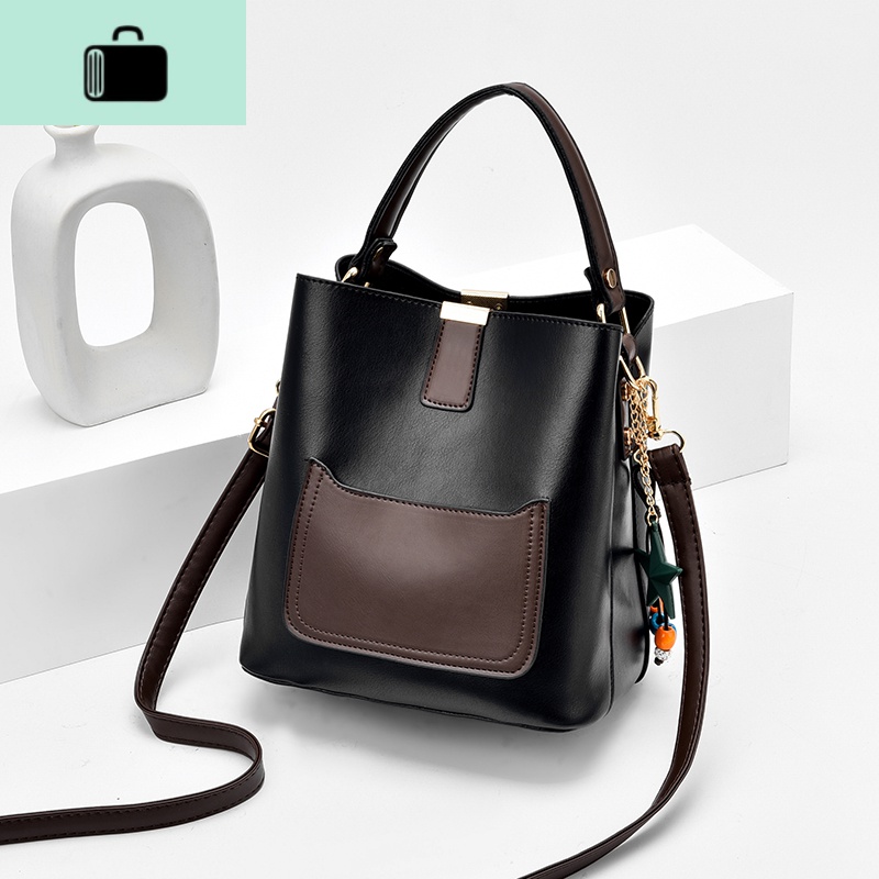 包包女2020春夏新款印花单肩包韩版百搭宽肩水桶包复古女式斜挎包NEWLAKE 口袋款黑色(单根肩带)