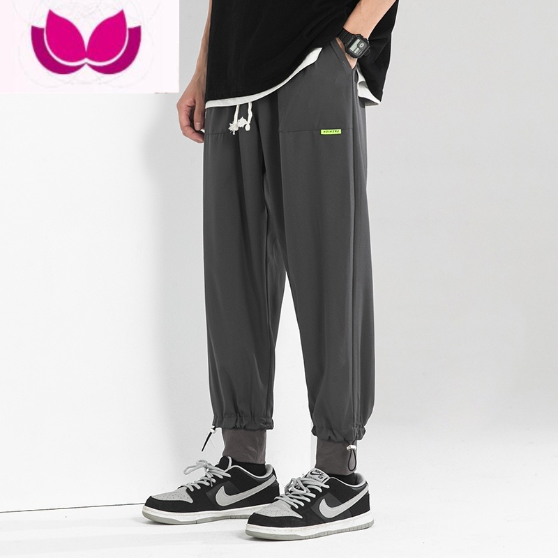 七斓日系潮牌裤子男士夏季薄款青少年运动休闲长裤宽松束脚黑色卫裤男