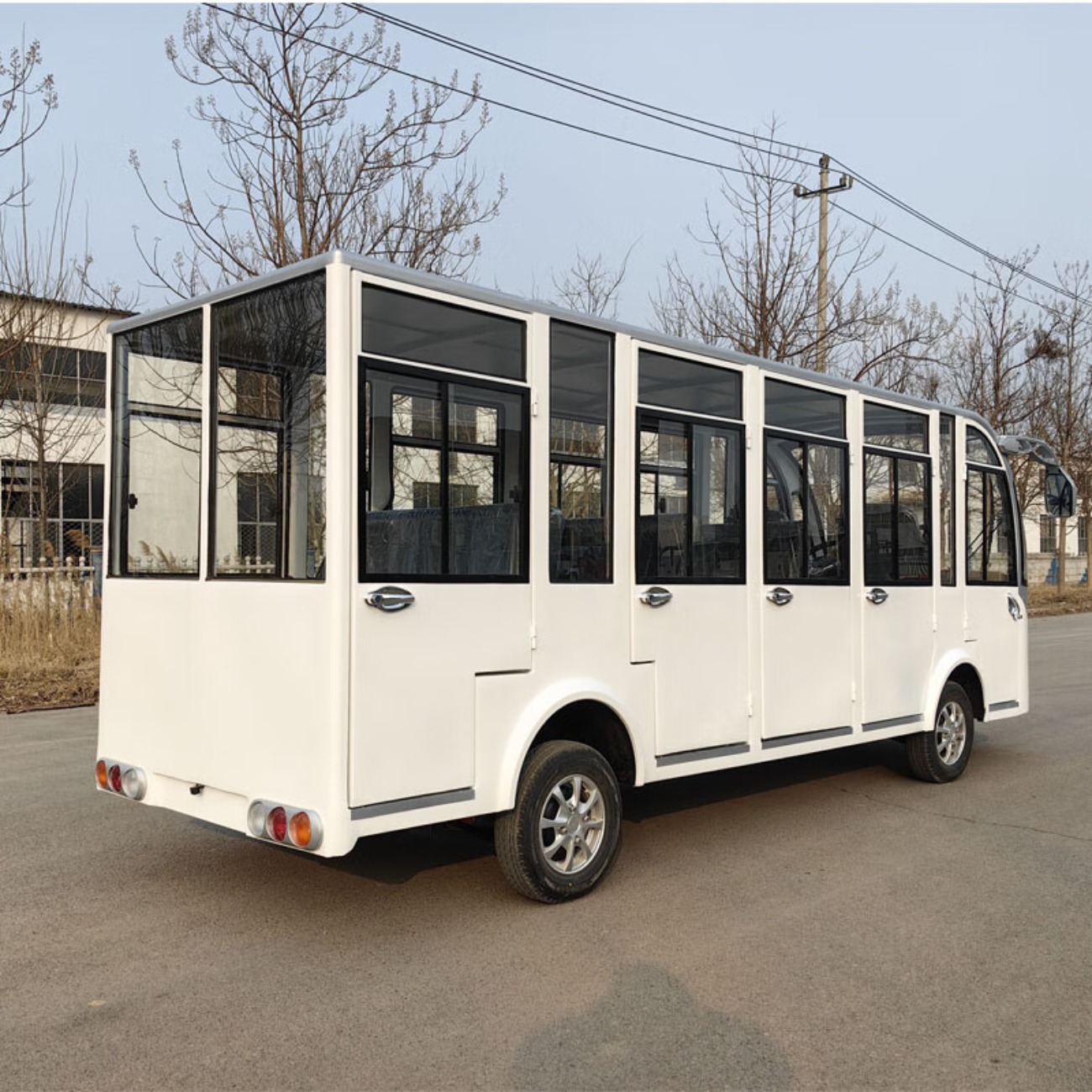 统航电动观光车5排14座园区接待景区休闲车机场中转大巴电动四轮车载客游览车 封闭顶配高清大图