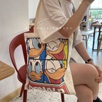 唐老鸭帆布包女单肩日系原宿ulzzang卡通拉链学生手提布袋购物袋 唐唐鸭(加厚有拉链) 收藏优先发(新款加大)