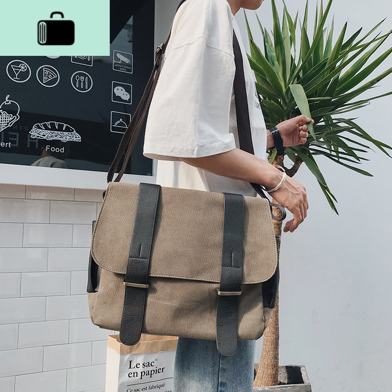 青年单肩包韩版男士斜跨旅行休闲街头斜挎包学生书包男包包帆布包new