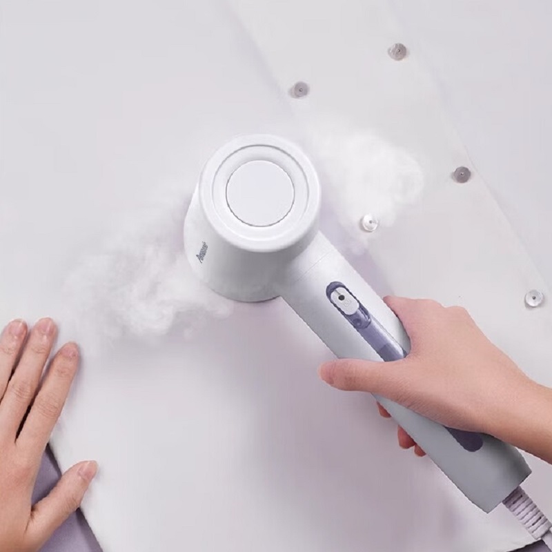 松下(Panasonic)挂烫机 家用手持蒸汽熨烫机 小型便携 快速除皱 恒温护衣 一机多用 NI-GHD029高清大图