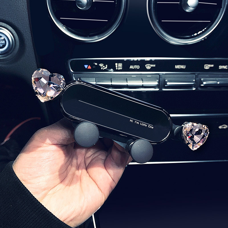 创意镶钻爱心车载手机支架卡扣式汽车出风口手机导航支架重力通用
